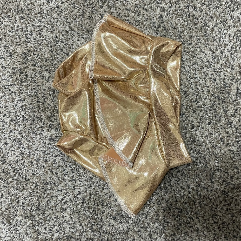 6-9 gold skirted bummies